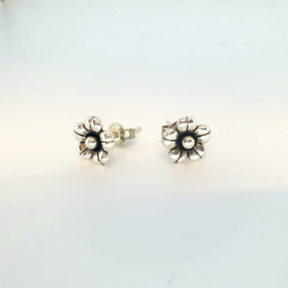 Designer silver sale stud earrings